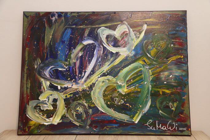 Farbenfrohes Acrylbild mit Herzmotiven.